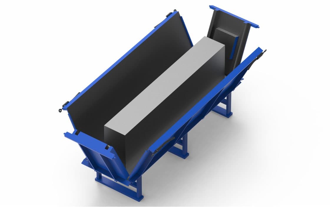 Trench mould with side panels released, exposing the cast unit